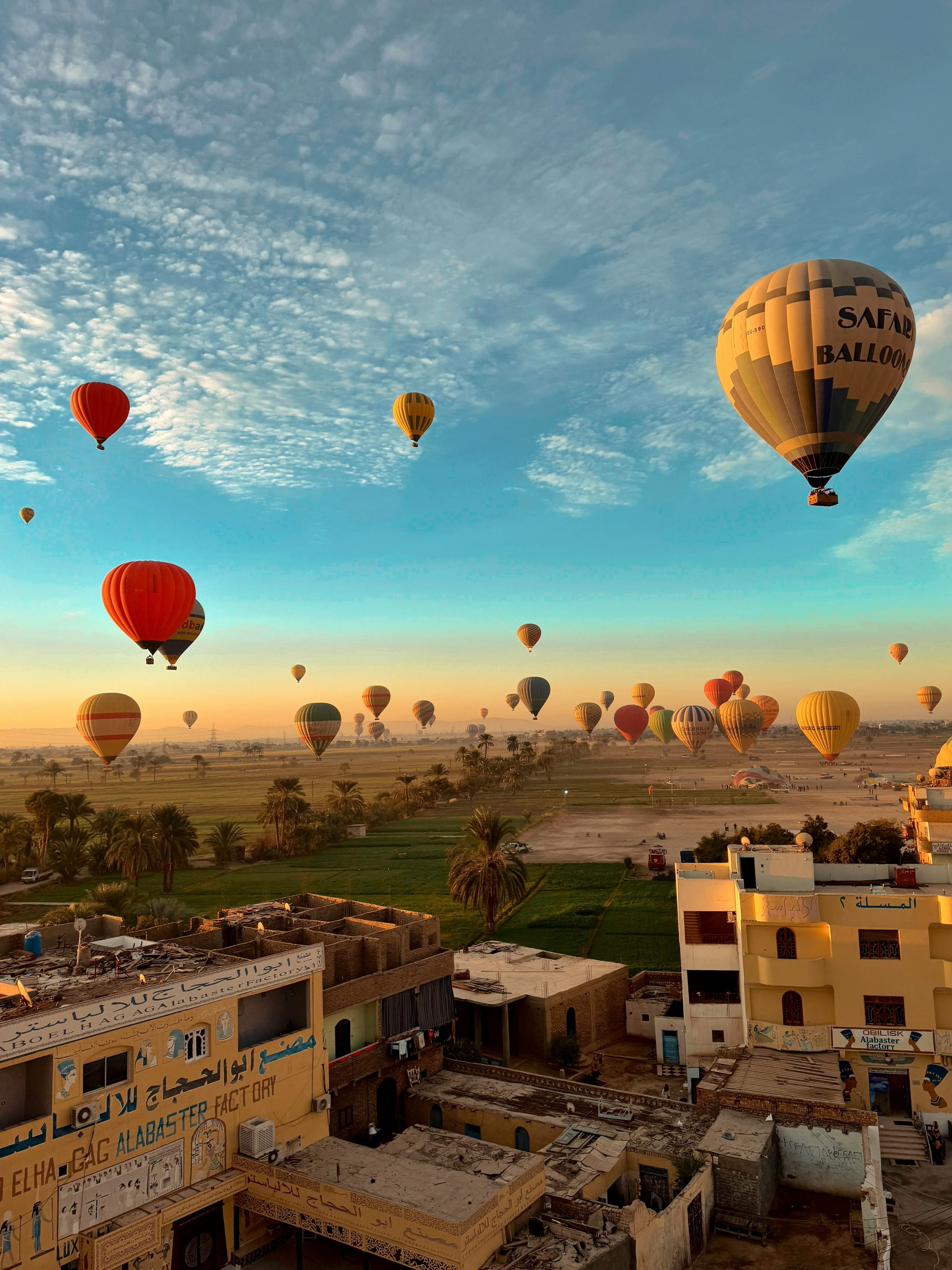 Balloons over the west bank at dawn