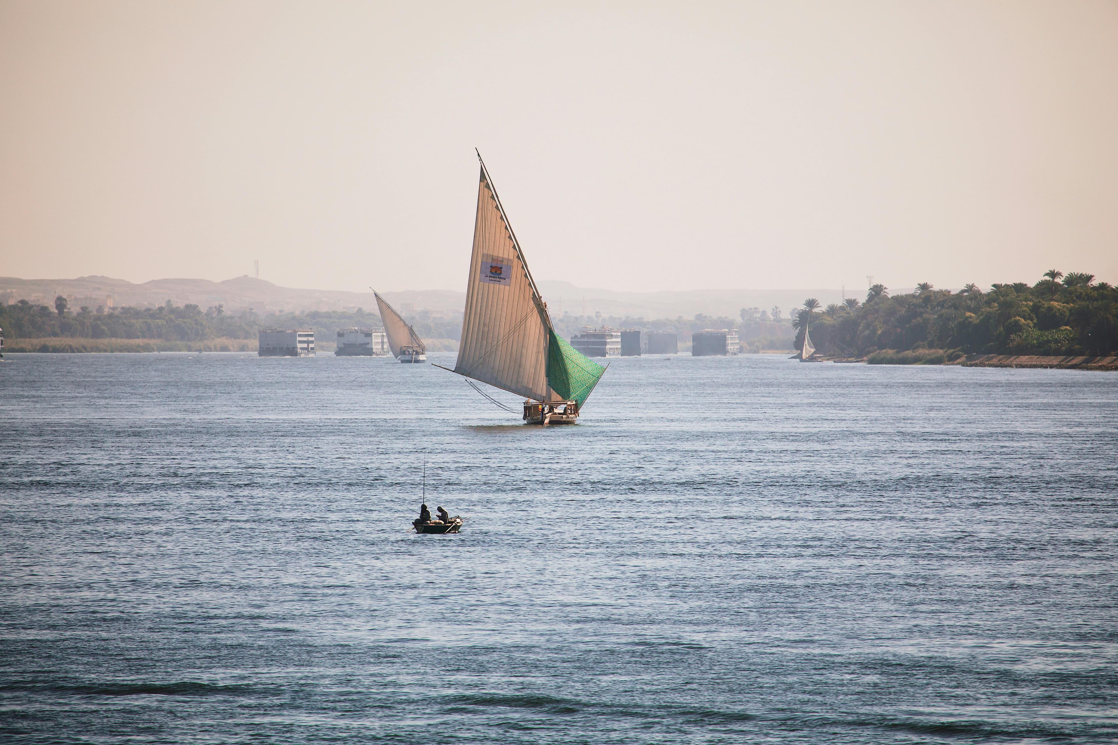 A boat drawn up on the riverbank.
