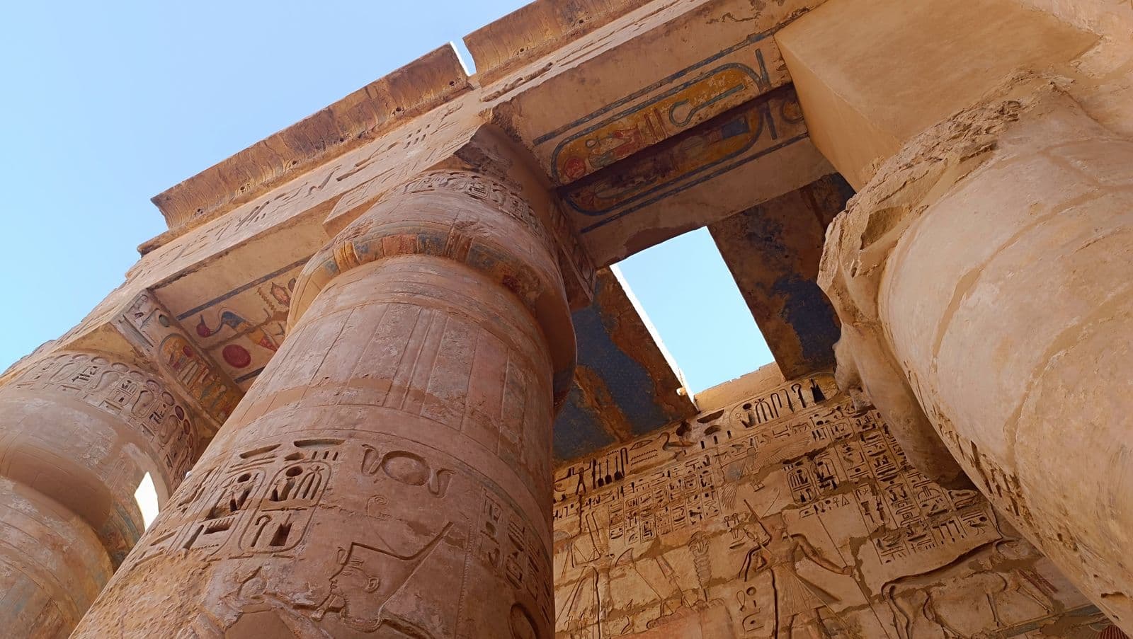Colour still clinging to the hypostyle hall — even overhead.